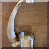 K06. Horn bottle handle. 
